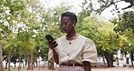 Business, walking and black woman in city, smartphone for texting and message to contact. Professional, mobile user or African person in street, cellphone and digital app for social media or chatting