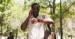 Black man, student and time with phone call outdoor for discussion, running late and class delay. Male person, mobile or wristwatch for exam schedule, contact university and admission inquiry at park