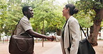 Friends, handshake, and park with business people meeting for agreement, partnership or thank you. B2B, contract and success with happy employee team shaking hands outdoor for motivation or welcome