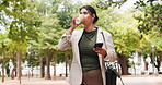 Coffee, park and phone with business woman walking for morning commute to work location. App, thinking and typing with employee person outdoor for communication, drink or mobile text message