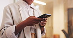 Woman, hands and browsing in office with phone, text message or search trend for social media marketing. Person, tech and typing in workplace with online chat, internet or email for digital branding.