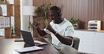 Fist pump, headset and typing with black man in call center for assistance, help or online support. Computer, customer service and success with excited African employee in agency office for feedback