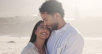 Beach, hug and couple on break, love and bonding on summer holiday, laughing or romance with partner. Outdoor, man and embrace with woman on vacation, happiness and commitment for relationship at sea