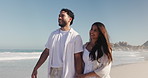 Vacation, holding hands and couple walk at beach for care, support and sightseeing with partner. Connection, man and woman travel by ocean for summer holiday, love and happiness outdoor on island