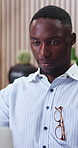 Business, thinking and black man in office with laptop, doubt and problem solving for finance investment. Confused, person and reading in workplace with computer, financial risk and idea for funding.