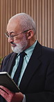 Businessman, speaking and presentation with tablet in office, insurance proposal and pitch idea. Technology, corporate and mature presenter in meeting for risk management, planning or policy review