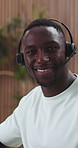 Face, black man and smile with headset in call centre for career pride, about us and telecom. Portrait, male person and advisor with mic for customer service, technical support and crm representative