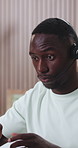 Call center, advice and black man with headset, office and discussion with client or troubleshooting. Talking, IT specialist and person with mic for communication, tech support and problem solving