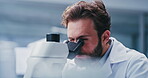 Lab, scientist and man with microscope, healthcare or cell analysis for vaccine and medical research. Science, innovation and person with equipment for study, medicine and investigation in clinic