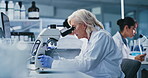 Cell, analysis and woman with microscope, lab and medical study for mRNA vaccine and pharmaceutical. Clinic, scientist and research for HIV cure development, innovation and mature person with tech