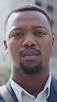 Realtor, face or man in city with confidence, pride or job goals in property management. Serious  portrait or black real estate agent with ambition, career growth or experience in housing industry.