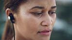 Earphones, fitness and thinking with woman on beach for recovery or rest from training fatigue, Breathing, exercise and tired with exhausted person outdoor for health, cardio workout or wellness