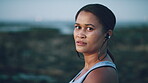 Earphones, exercise and face with woman on beach for recovery or rest from training fatigue, Breathing, fitness and tired with exhausted person outdoor for health, cardio workout or wellness
