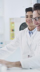 Scientist, team and happy with laptop in lab for experiment results, medical research or innovation. Science, people or smile with tech at work for vaccine development, clinical trial or breakthrough