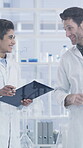 Talking, science or people with board in lab, chemical compound experiment or medical research team. Review formula, cure discussion or scientist with clipboard for problem solving, writing or smile