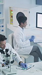 Scientist, laboratory and team with microscope for test analysis, medical research and chemistry. Time lapse, biotechnology and people with notes for pathology, experiment or forensic documents