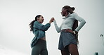 Runner, laugh and high five with women in city for workout partner, health and training goal. Running team, wellness and exercise club with low angle of friends for fitness, target and support