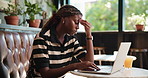 Headache, laptop and remote work with black woman in coffee shop for error or problem solving. Computer, glitch and stress with freelance employee in cafe or restaurant for planning or research