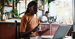 Laptop, hybrid work and woman on video call in cafe, social media marketing or finish meeting. Computer, coffee shop and freelance marketer in webinar, smile and talk with earphones for sponsorship