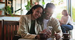 Date, couple and laugh with phone in coffee shop for online post, social media scroll or web research. Happy people, smile and technology in cafe for streaming service, bonding together or connection