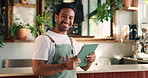 Face, barista and man with tablet, cafe and menu update in small business, laughing and stock order. Happy, entrepreneur and person with tech for inventory management, online and pride in coffee shop
