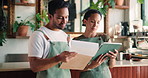 People, discussion and clipboard in cafe with tablet, online order or plan for inventory management. Team, talk and digital tech in coffee shop with checklist, hospitality service or menu development