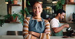 Crossed arms, woman and face of waitress in coffee shop for confidence in hospitality career. Happy, small business and portrait of female server with pride for customer service at cafe in Colombia.