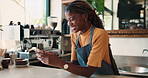Texting, laugh and black woman in cafe with phone, online gif or chat reaction on work break. Happiness, typing or barista in restaurant with tech, funny review or hospitality meme in free time.