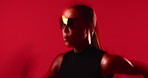 Fitness, motion blur or woman in studio with running, cardio or stamina exercise in speed activity. Fast, intense sprint or person with space, sports hobby or endurance workout on red background.