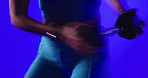 Dumbbell, hands and motion blur with fitness person in studio for training or workout routine. Equipment, exercise and weights with athlete isolated on blue background for flexibility or mobility