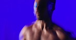 Fitness, motion blur or person in studio with running, cardio or stamina exercise in speed activity. Fast, intense sprint or man with space, energy hobby or endurance workout on blue background.