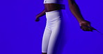 Fitness, hands and jump rope in studio for exercise, training and cardio on blue background. Workout, skipping or woman with equipment for endurance, sports and agile with calorie burn for health