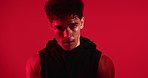 Man, face and sweat in studio with fitness for break, breathing and tired for wellness on red background. Person, exhausted and burnout in portrait for exercise, rest or hoodie for fatigue in Mexico
