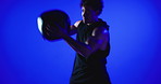 Studio, fitness and man with medicine ball, training and workout routine for body strength or health. Blue background, exercise and person with equipment for muscle development, athlete and wellness