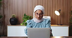 Laptop, reading and thinking with business woman in office for finance, planning or research. Administration, computer and report with Muslim employee in financial workplace for wealth management