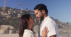 Forehead kiss, travel or couple at beach with smile, fresh air or bonding together on summer break. Love, man or woman with care, partner connection or healthy relationship on romantic vacation.

