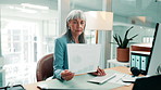 Woman, typing and document in office with computer, data analysis or comparison for financial audit. Mature businessperson, research or desktop in workplace with finance performance, stats or graphs.