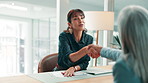 Handshake, interview and meeting with business women in office together for onboarding success. Deal, human resources and recruitment with employee people shaking hands at work for job opportunity