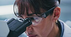 Lab, scientist and woman with microscope, glasses and exam for vaccine, analysis or medical research. Science, innovation and mature person with equipment for medicine, healthcare and investigation