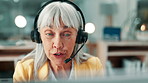 Call center, headset and woman in office, talking and consultation for help desk. Mature person, telemarketing and employee in workplace, conversation or contact us for customer service or connection