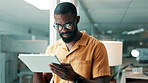 Black man, web designer and research with tablet in office for creative project, ideas or schedule. Male person, employee or scrolling on technology for design improvement or development in workplace