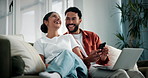 Laptop, laughing and phone with couple on sofa in home living room together for bonding or break. App, computer and funny with happy people in apartment for communication, connection or relationship