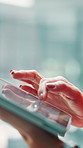 Tablet, scrolling and hand of businesswoman in office with research, communication or email for finance. Digital technology, reading and female financial manager with contact for investment project.