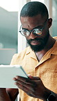 Tablet, scroll and black man in office with research, glasses and online for social media marketing. Person, reading and browsing trends in workplace with tech, website and planning for advertising.