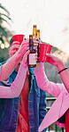 Celebration, cheers or people in backyard with alcohol, happiness or bonding together at reunion event. Bokeh, beer or friends at house with toast, birthday party or drinks at social gathering.