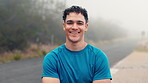 Fitness, rain and face of man outdoor for cardio exercise, wellness dedication and practice. Fog weather, athlete and happy in road for winter workout, sport discipline or confidence for health goals