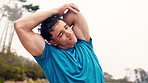 Stretching, fitness and man on mountain for outdoor workout, training or health in nature. Sports, wellness and male person with arm warm up for cardio exercise, challenge or active in forest.