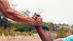 Mountain, help and hands of men for fitness, hiking and exercise for adventure in nature. Athlete, outdoor and people with support for workout, trekking or training together for endurance or wellness