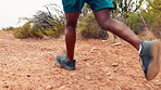 Running, nature and legs of man for fitness, exercise and cardio workout for wellness. Athlete, mountain and person on outdoor trail with active hobby for health, endurance and challenge for training