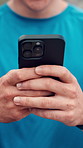 Cellphone, hands and man in nature for fitness with texting, communication or chatting on mobile app. Technology, sports and male person with phone for online workout, exercise or training outdoor.